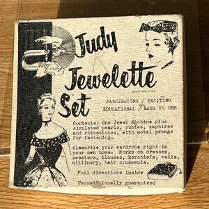 Vintage 1950s Judy Jewelette fabric decorating tool with instructions.